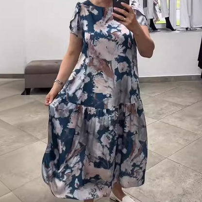 👗Nowość na wczesne lato✨Luźna sukienka w kwiaty z okrągłym dekoltem i krótkim rękawem