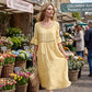 Damski midi dress z koronkowymi, rozkloszowanymi rękawami